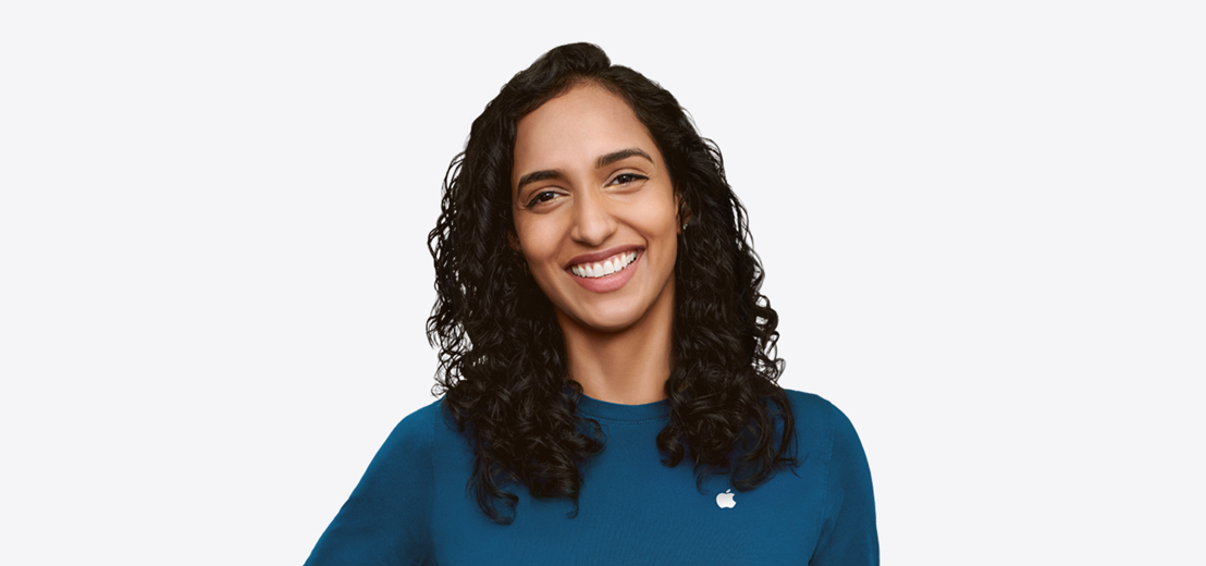 Apple Specialist smiling with an approachable demeanor