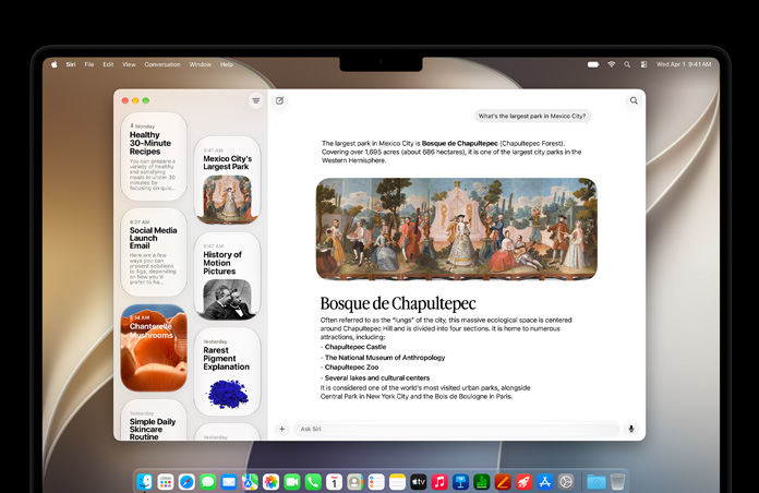 14‑calowy MacBook Pro w kolorze gwiezdnej czerni. Na ekranie widać aplikację Siri wyświetlającą aktywną rozmowę z Siri AI i poprzednie konwersacje na pasku bocznym.