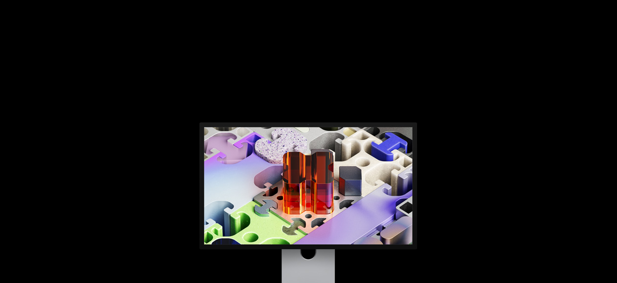 الجانب الأمامي لشاشة Studio Display XDR مع خلفية شاشة تشبه أحجية ثلاثية الأبعاد