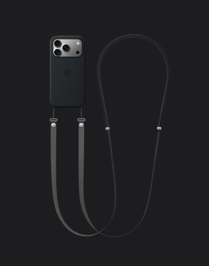 iPhone 17 Pro, tagakülg, hõbedane viimistlus, koos musta värvi MagSafe'i silikoonümbrise ja tumehalli Crossbody rihmaga