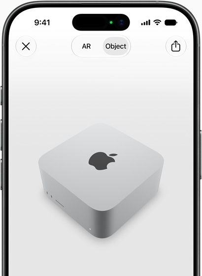 Un iPhone previsualizando una Mac Studio con realidad aumentada